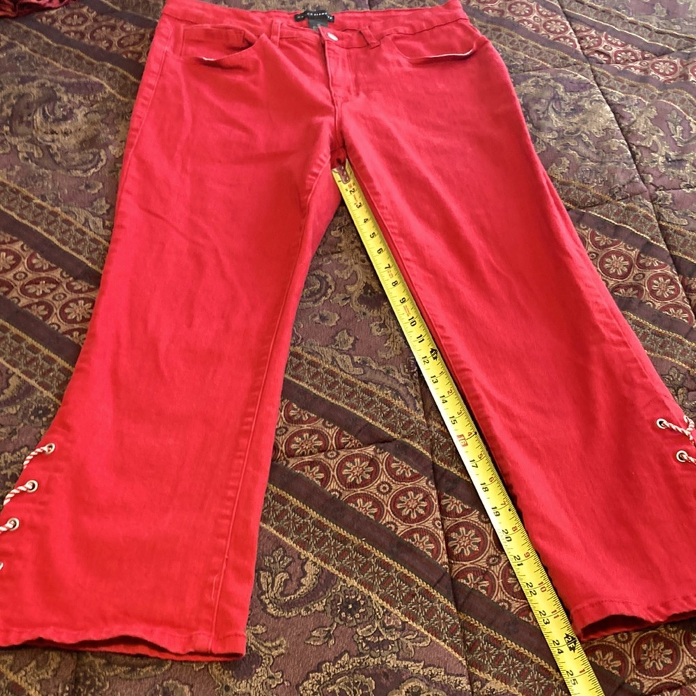 Cute red Capri pants with laces at bottom